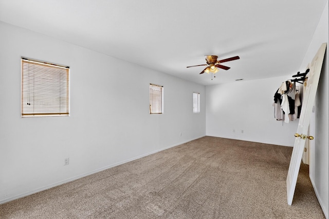 4249 Montera Pl NW, Albuquerque, NM 87114 - carpeted empty room featuring a ceiling fan and baseboards