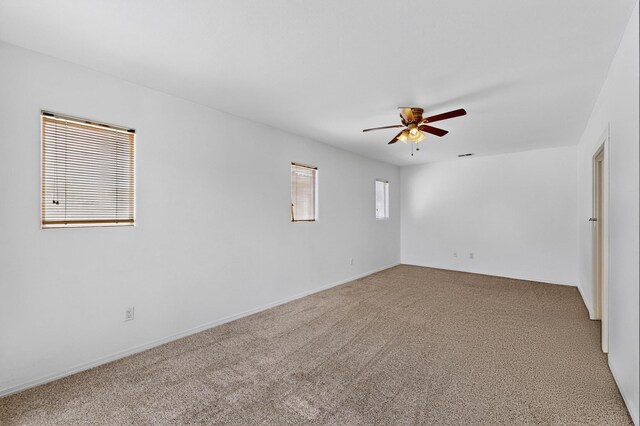 4249 Montera Pl NW, Albuquerque, NM 87114 - unfurnished room with a ceiling fan and carpet flooring