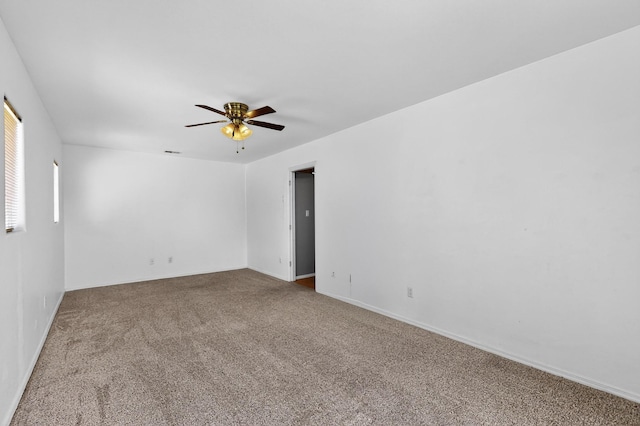 4249 Montera Pl NW, Albuquerque, NM 87114 - carpeted spare room featuring a ceiling fan and baseboards