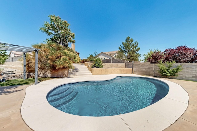 4249 Montera Pl NW, Albuquerque, NM 87114 - view of swimming pool featuring a fenced backyard, stairway, and a pergola