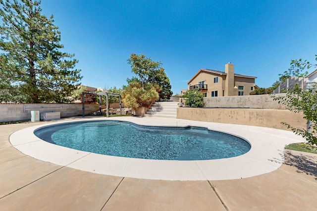 4249 Montera Pl NW, Albuquerque, NM 87114 - view of pool with a fenced backyard, stairs, a pergola, and a patio