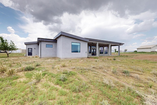 53 Blanco Dr, Edgewood, NM 87015 - back of property with stucco siding
