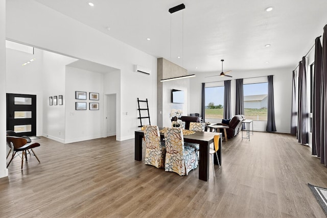 53 Blanco Dr, Edgewood, NM 87015 - dining space with light wood-type flooring, recessed lighting, a ceiling fan, and a towering ceiling