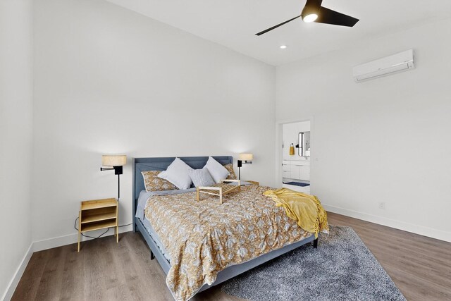 53 Blanco Dr, Edgewood, NM 87015 - bedroom featuring a wall mounted AC, wood finished floors, recessed lighting, ceiling fan, and a high ceiling