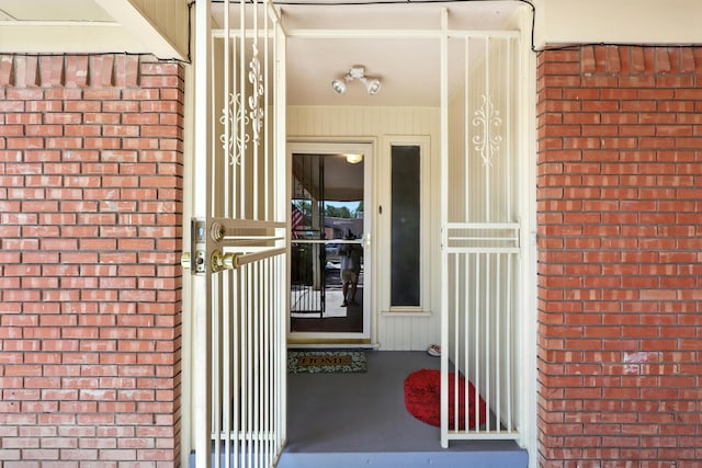 411 Schmidt Pl, Los Lunas, NM 87031 - doorway to property with brick siding