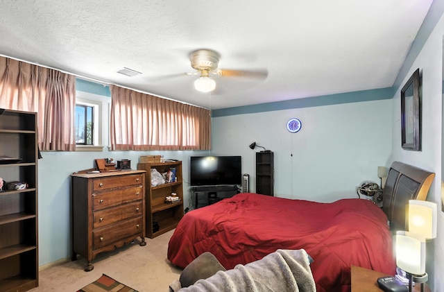 411 Schmidt Pl, Los Lunas, NM 87031 - carpeted bedroom featuring a ceiling fan