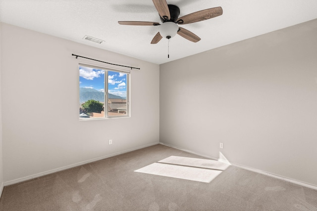 716 Palo Duro Dr, Bernalillo, NM 87004 - carpeted empty room featuring a ceiling fan and baseboards