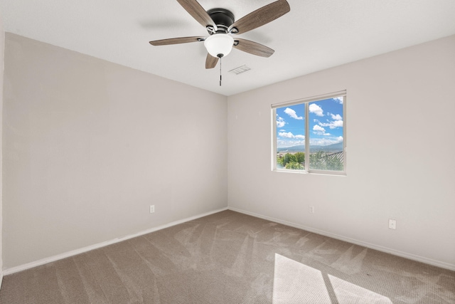 716 Palo Duro Dr, Bernalillo, NM 87004 - empty room featuring light colored carpet and a ceiling fan