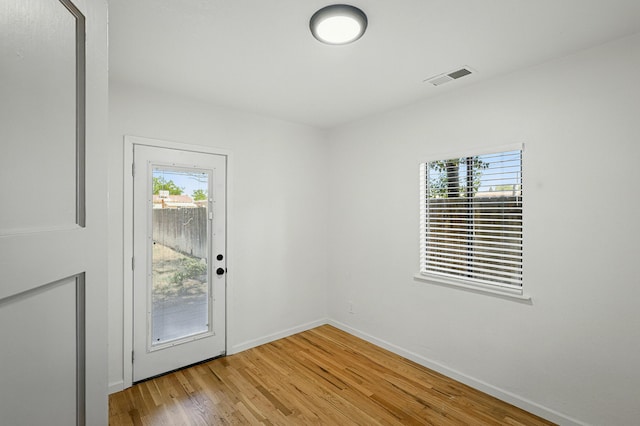 1202 Truman St SE, Albuquerque, NM 87108 - unfurnished room with light wood finished floors and baseboards