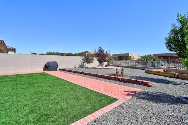 2530 Guadalupe Rd NE, Rio Rancho, NM 87144 - fenced backyard featuring a patio area