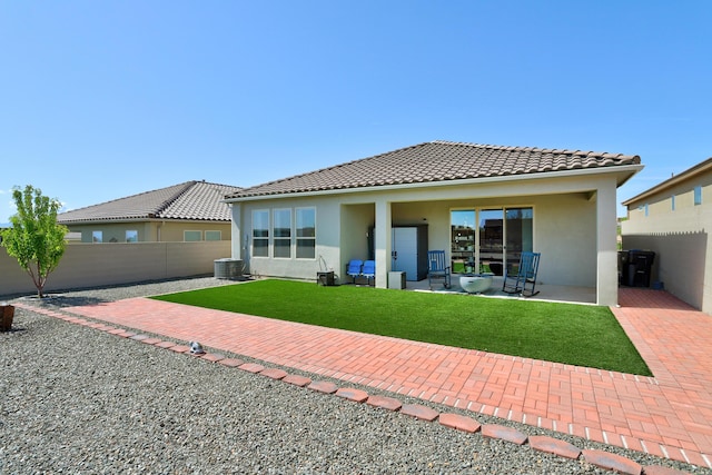 2530 Guadalupe Rd NE, Rio Rancho, NM 87144 - rear view of property with a patio area, stucco siding, a tile roof, and a fenced backyard