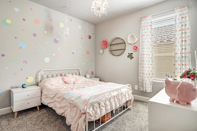 2530 Guadalupe Rd NE, Rio Rancho, NM 87144 - carpeted bedroom with a textured ceiling and a chandelier