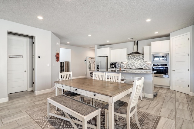 2530 Guadalupe Rd NE, Rio Rancho, NM 87144 - dining room featuring recessed lighting and a textured ceiling