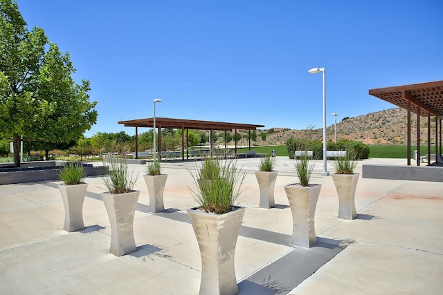 2530 Guadalupe Rd NE, Rio Rancho, NM 87144 - view of community with a mountain view and a patio area