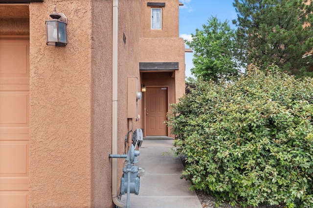 1717 Cortina Loop SE, Rio Rancho, NM 87124 - view of exterior entry featuring stucco siding