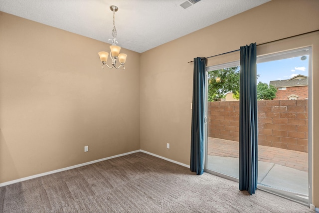 1717 Cortina Loop SE, Rio Rancho, NM 87124 - empty room featuring carpet floors and a chandelier