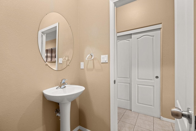 1717 Cortina Loop SE, Rio Rancho, NM 87124 - bathroom featuring tile patterned flooring and baseboards