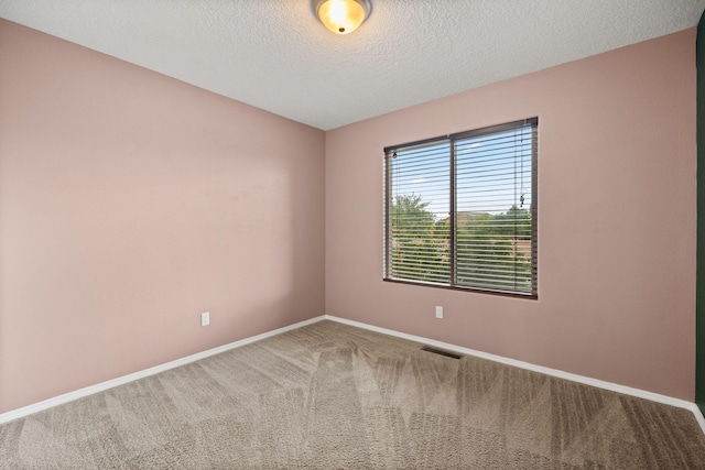 1717 Cortina Loop SE, Rio Rancho, NM 87124 - empty room with carpet flooring and a textured ceiling