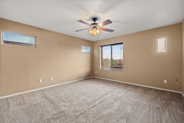 1717 Cortina Loop SE, Rio Rancho, NM 87124 - unfurnished room featuring carpet, ceiling fan, and a textured ceiling