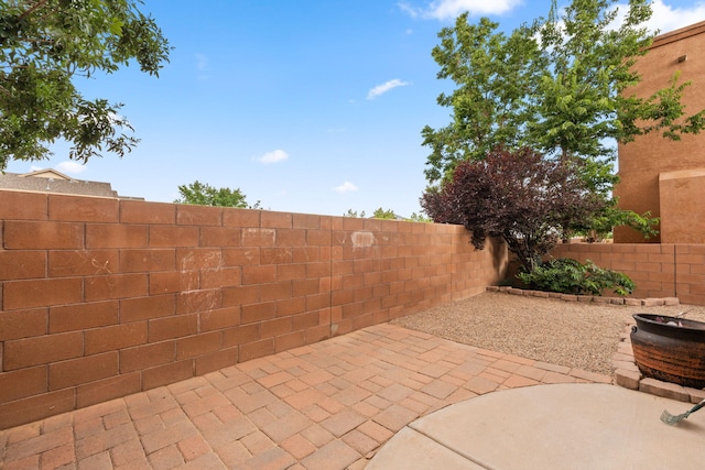 1717 Cortina Loop SE, Rio Rancho, NM 87124 - fenced backyard featuring a patio area