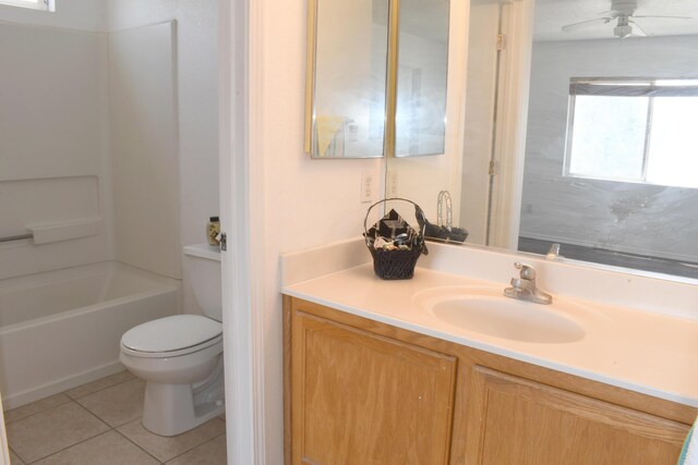 7527 Cricket Hill Dr NE, Albuquerque, NM 87113 - kitchen featuring stainless steel microwave, light countertops, freestanding refrigerator, a peninsula, and under cabinet range hood