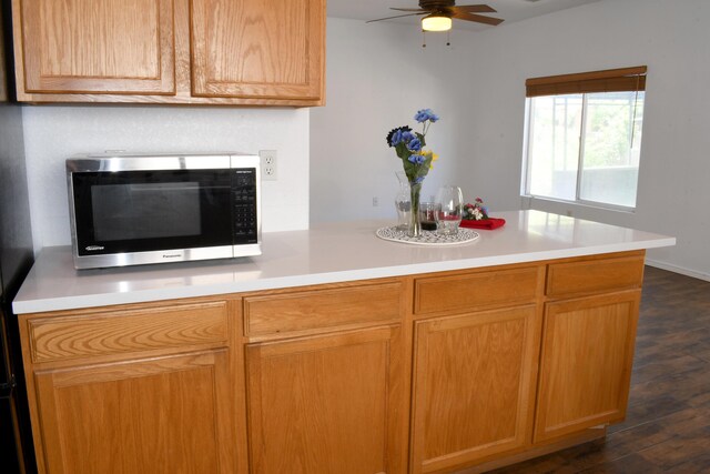 7527 Cricket Hill Dr NE, Albuquerque, NM 87113 - unfurnished room featuring baseboards and dark wood-style flooring