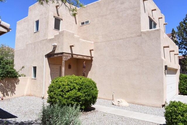 7527 Cricket Hill Dr NE, Albuquerque, NM 87113 - empty room with dark wood-type flooring and baseboards