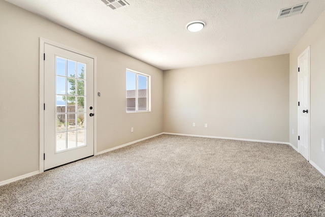 1004 11th St SE, Rio Rancho, NM 87124 - empty room featuring carpet and a textured ceiling