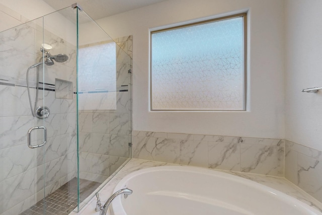 2855 Kings Canyon Loop NE, Rio Rancho, NM 87144 - bathroom with a garden tub and a stall shower
