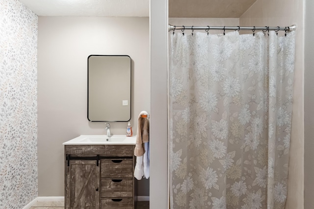 3921 Hilton Ave NE, Albuquerque, NM 87110 - bathroom featuring vanity and a shower with shower curtain