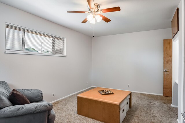 3921 Hilton Ave NE, Albuquerque, NM 87110 - playroom with light colored carpet and ceiling fan