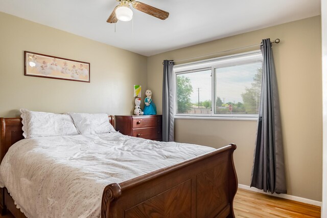 3921 Hilton Ave NE, Albuquerque, NM 87110 - bedroom featuring light wood-style floors and ceiling fan