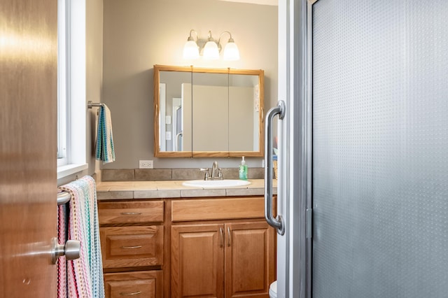 3921 Hilton Ave NE, Albuquerque, NM 87110 - bathroom featuring vanity and toilet