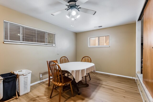 3921 Hilton Ave NE, Albuquerque, NM 87110 - dining space with light wood finished floors and ceiling fan