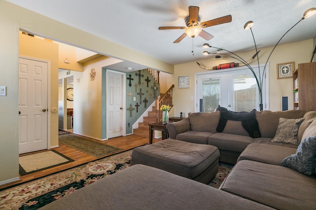 1897 Raspberry Ct NE, Rio Rancho, NM 87144 - living area featuring stairway, wood finished floors, and a ceiling fan