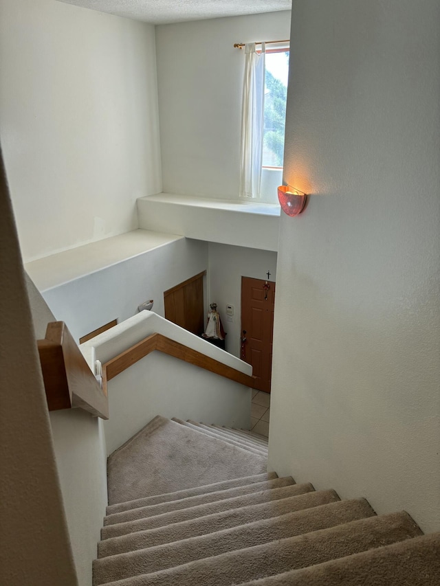 9523 Akutan Ct NW, Albuquerque, NM 87120 - staircase with tile patterned floors