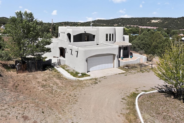 10 Francisco Rd, Cedar Crest, NM 87008 - view of front of property featuring dirt driveway and stucco siding