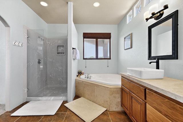 10 Francisco Rd, Cedar Crest, NM 87008 - full bath featuring walk in shower, a bath, vanity, tile patterned flooring, and recessed lighting