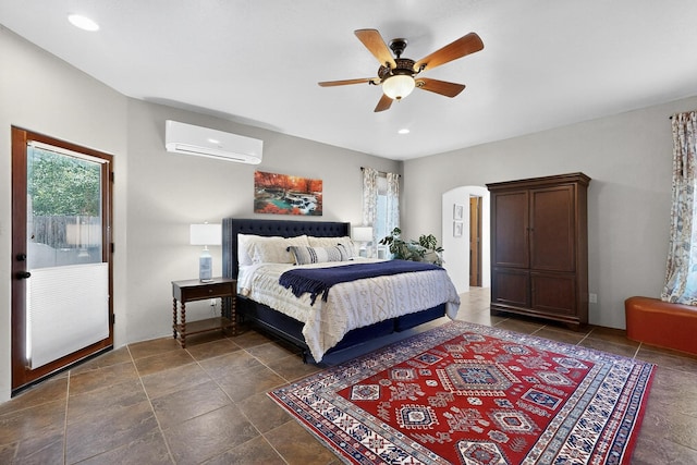 10 Francisco Rd, Cedar Crest, NM 87008 - bedroom with a wall mounted air conditioner, arched walkways, ceiling fan, and recessed lighting