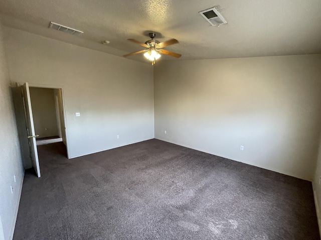 10608 Buck Island Rd SW, Albuquerque, NM 87121 - empty room featuring a ceiling fan, dark carpet, and a smoke detector