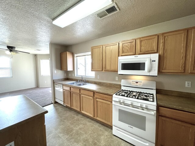 10608 Buck Island Rd SW, Albuquerque, NM 87121 - kitchen featuring white appliances, a textured ceiling, ceiling fan, and open floor plan