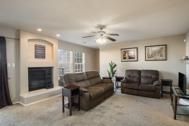 4840 Mcnary Ct NW, Albuquerque, NM 87120 - living room with carpet, a ceiling fan, a glass covered fireplace, and recessed lighting
