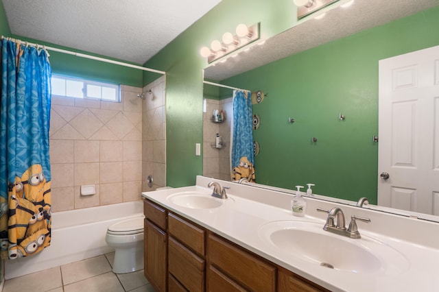 4840 Mcnary Ct NW, Albuquerque, NM 87120 - bathroom with shower / tub combo with curtain, double vanity, tile patterned floors, and a textured ceiling