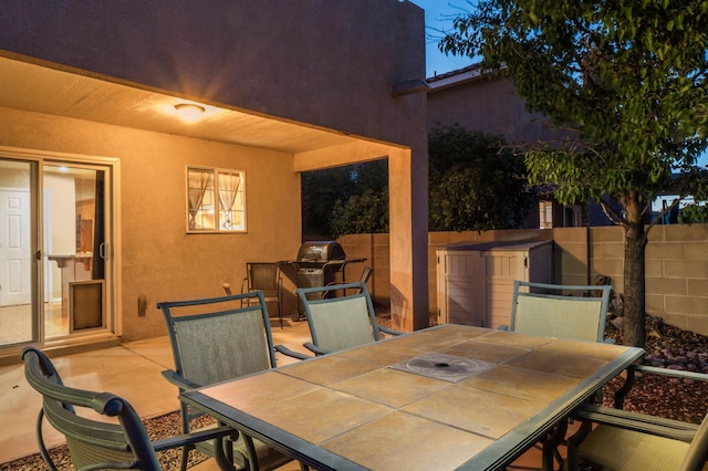 4840 Mcnary Ct NW, Albuquerque, NM 87120 - view of patio with outdoor dining area and a grill