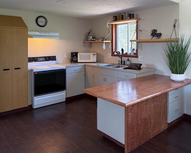 162 Black Bear Rd, Ramah, NM 87321 - kitchen featuring white appliances, open shelves, and dark wood finished floors