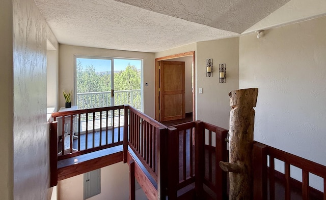 162 Black Bear Rd, Ramah, NM 87321 - stairway with a textured ceiling