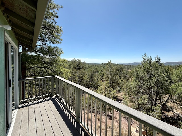 162 Black Bear Rd, Ramah, NM 87321 - balcony featuring a wooded view