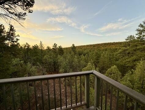 162 Black Bear Rd, Ramah, NM 87321 - balcony featuring a view of trees