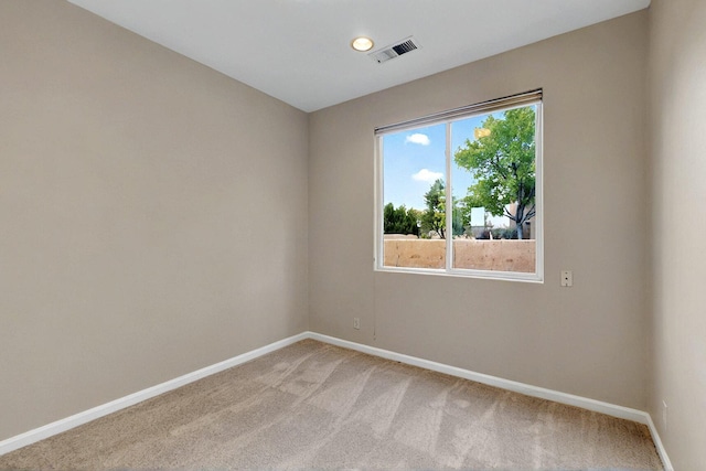 5 Woodflower Pl, Santa Fe, NM 87508 - empty room with light colored carpet and baseboards
