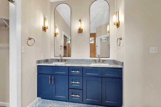 5 Woodflower Pl, Santa Fe, NM 87508 - bathroom featuring double vanity and baseboards